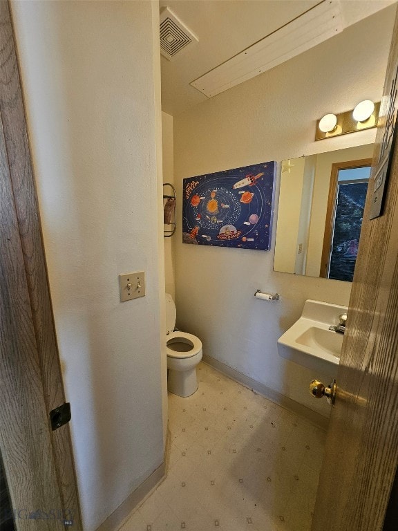 1769 W Kagy Blvd, Bozeman, MT 59715 - bathroom featuring tile patterned floors and toilet