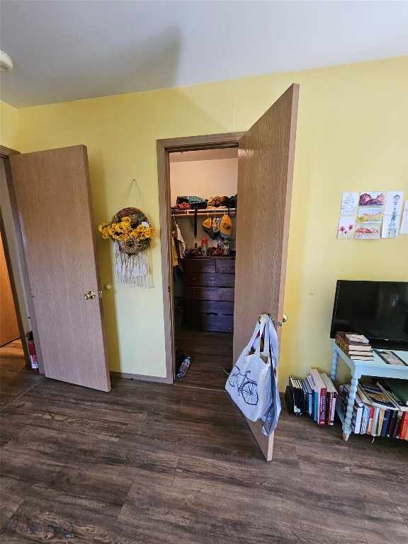 1769 W Kagy Blvd, Bozeman, MT 59715 - bedroom with wood finished floors, a spacious closet, and a closet