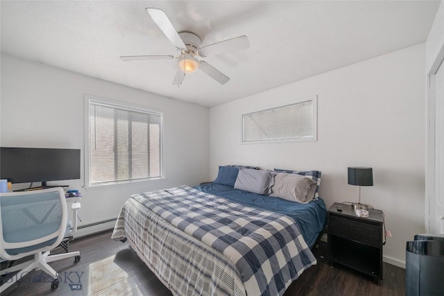 217 Lillian Way, Bozeman, MT 59718 - bedroom featuring dark wood-style flooring and a ceiling fan