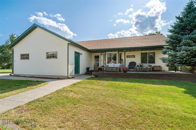 217 Lillian Way, Bozeman, MT 59718 - back of house featuring covered porch and a yard