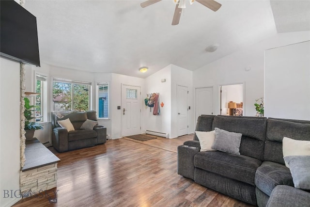 217 Lillian Way, Bozeman, MT 59718 - living room with baseboard heating, ceiling fan, wood finished floors, and vaulted ceiling
