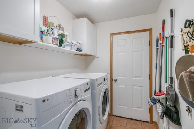 217 Lillian Way, Bozeman, MT 59718 - washroom with cabinet space, separate washer and dryer, and light tile patterned floors