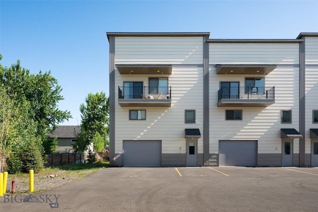 223 New Ventures Dr, Bozeman, MT 59718 - view of property featuring an attached garage