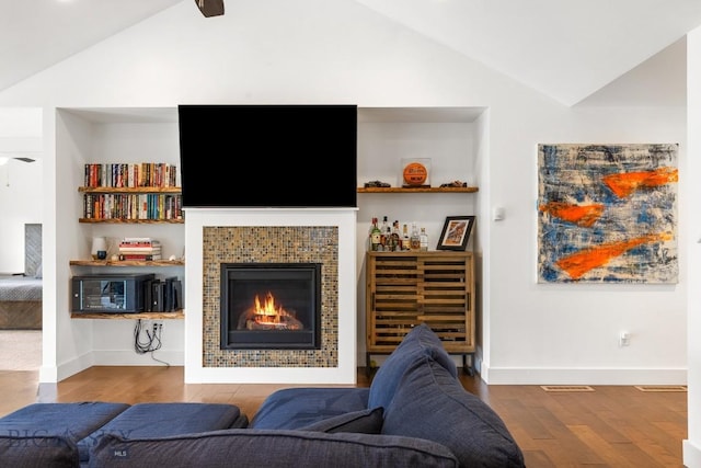 38 Red Rock, Bozeman, MT 59718 - living room with vaulted ceiling, wood finished floors, and a tile fireplace