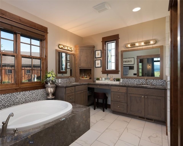 1400 Cottontail Rd, Gallatin Gateway, MT 59730 - bathroom featuring marble finish floors, a bath, and vanity