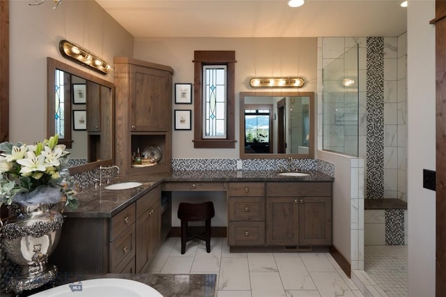 1400 Cottontail Rd, Gallatin Gateway, MT 59730 - full bathroom featuring a tile shower, double vanity, marble look tiles, a tub, and recessed lighting