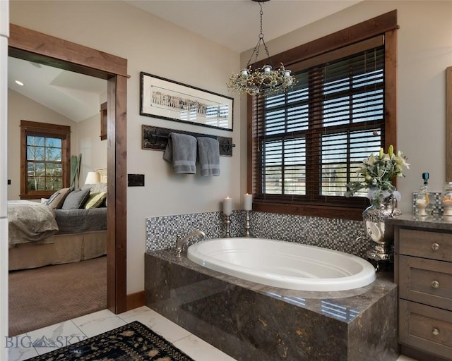 1400 Cottontail Rd, Gallatin Gateway, MT 59730 - ensuite bathroom with a bath, plenty of natural light, a chandelier, and vanity