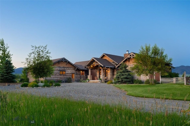 1400 Cottontail Rd, Gallatin Gateway, MT 59730 - craftsman house with stone siding and a chimney