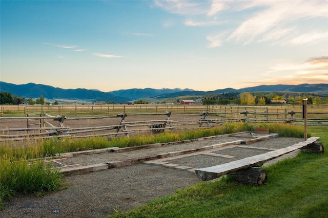 1400 Cottontail Rd, Gallatin Gateway, MT 59730 - yard at dusk featuring a view of countryside and a mountain view