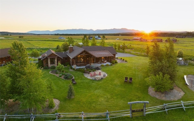 1400 Cottontail Rd, Gallatin Gateway, MT 59730 - aerial view at dusk of a view of countryside and a mountain view