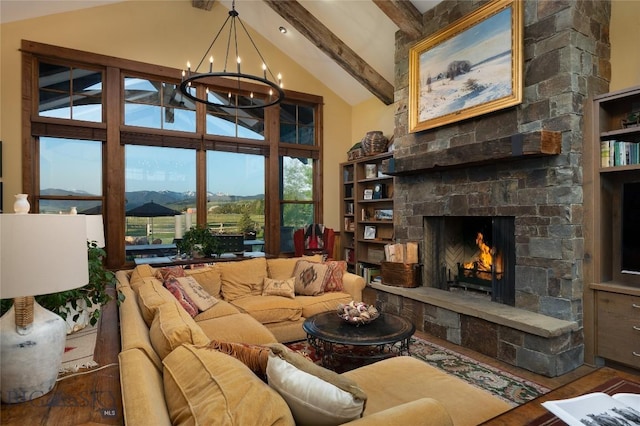 1400 Cottontail Rd, Gallatin Gateway, MT 59730 - living room featuring high vaulted ceiling, a fireplace, beamed ceiling, a chandelier, and wood finished floors