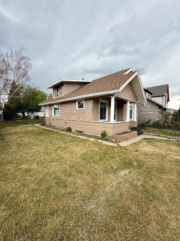 1717 Lowell, Butte, MT 59701 - back of property featuring a lawn