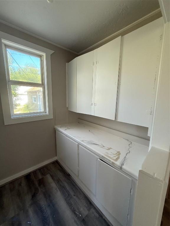 1717 Lowell, Butte, MT 59701 - washroom featuring dark wood-type flooring and ornamental molding