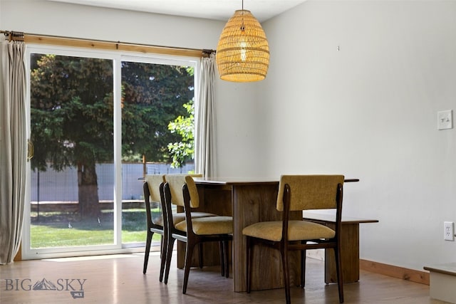 11 N Yellowstone Ave, Bozeman, MT 59718 - dining space with healthy amount of natural light, wood finished floors, and a dry bar