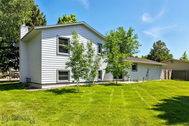 11 N Yellowstone Ave, Bozeman, MT 59718 - back of property with a chimney