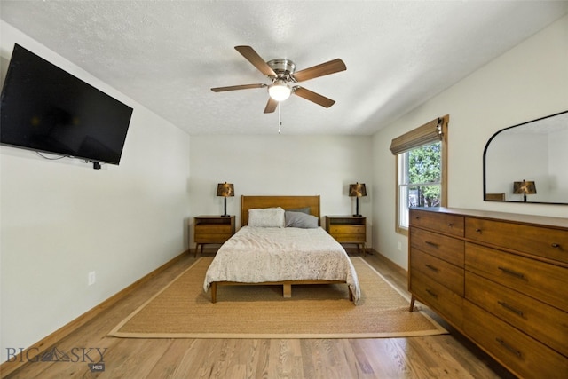 11 N Yellowstone Ave, Bozeman, MT 59718 - bedroom with light wood-type flooring and ceiling fan