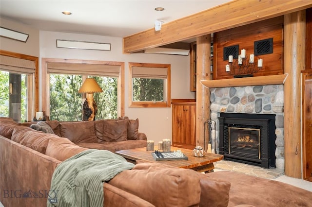 11540 Taiga Trl, Bozeman, MT 59715 - living area with a fireplace, beamed ceiling, and recessed lighting