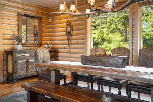 11540 Taiga Trl, Bozeman, MT 59715 - dining room with wood finished floors and log walls