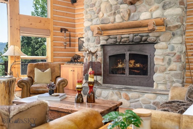 11540 Taiga Trl, Bozeman, MT 59715 - living room featuring a fireplace and rustic walls