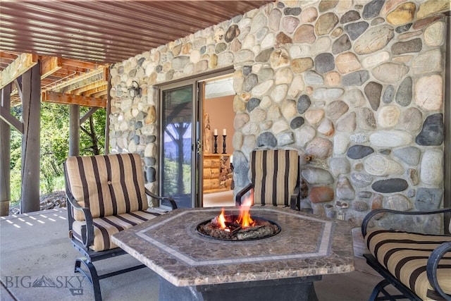 11540 Taiga Trl, Bozeman, MT 59715 - view of patio with an outdoor fire pit