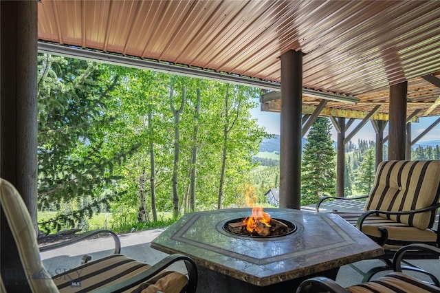 11540 Taiga Trl, Bozeman, MT 59715 - view of patio featuring a fire pit