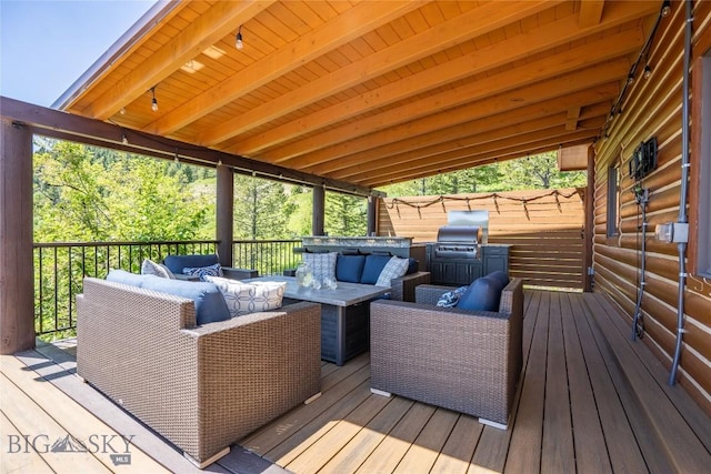 11540 Taiga Trl, Bozeman, MT 59715 - wooden deck featuring an outdoor living space and grilling area