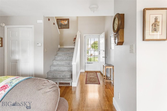 1406 Gilman Ave, Butte, MT 59701 - entrance foyer featuring wood finished floors and stairway