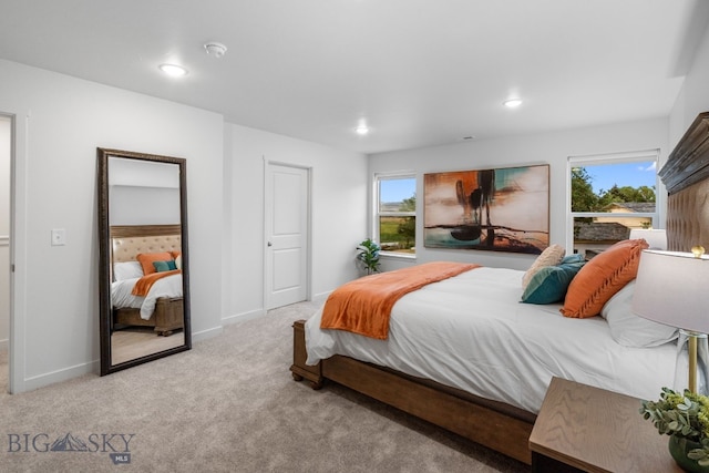 402 W Manhattan Ave Unit B, Manhattan, MT 59741 - carpeted bedroom featuring multiple windows and recessed lighting