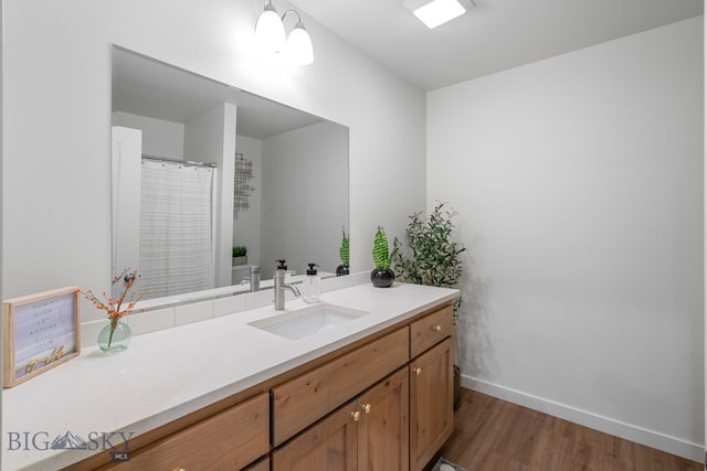 402 W Manhattan Ave Unit B, Manhattan, MT 59741 - bathroom with vanity and wood finished floors