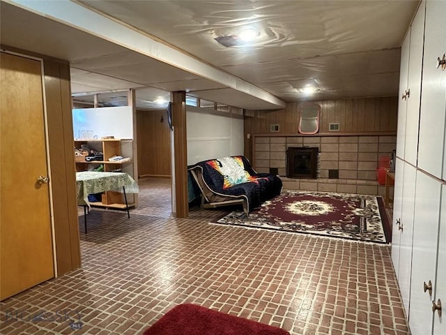 1914 Haggin, Anaconda, MT 59711 - finished below grade area with wood walls, a fireplace, and brick patterned floors