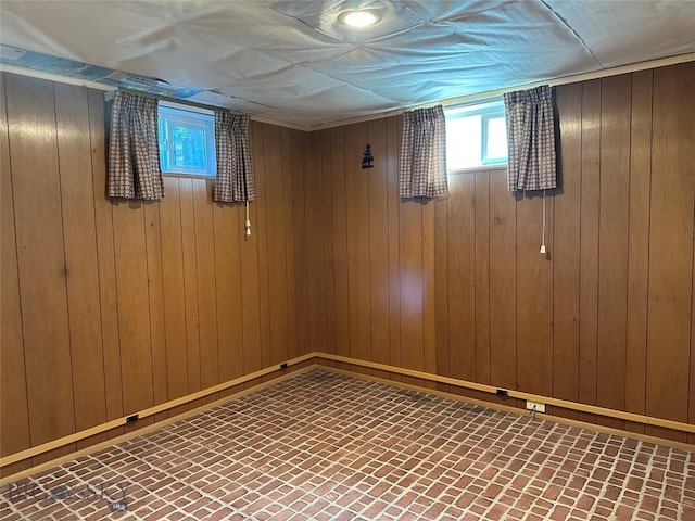 1914 Haggin, Anaconda, MT 59711 - basement with plenty of natural light, wood walls, and brick patterned floors
