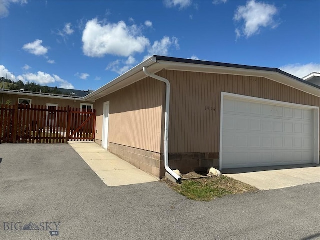 1914 Haggin, Anaconda, MT 59711 - view of property exterior with a garage and driveway