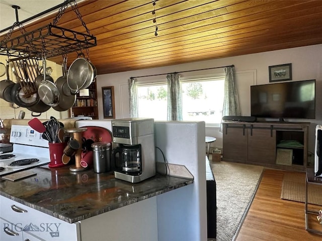 1914 Haggin, Anaconda, MT 59711 - kitchen featuring white electric range, wood ceiling, and wood finished floors