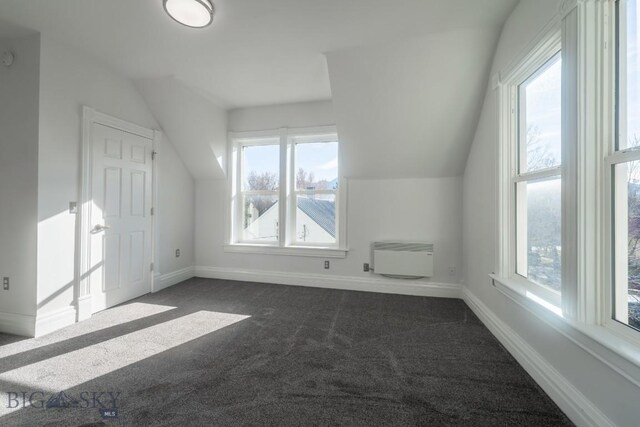 416 N 3rd St, Livingston, MT 59047 - bonus room featuring dark carpet, healthy amount of natural light, and vaulted ceiling