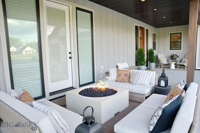 243 Tinkers Ln, Bozeman, MT 59718 - view of patio with an outdoor living space with a fire pit