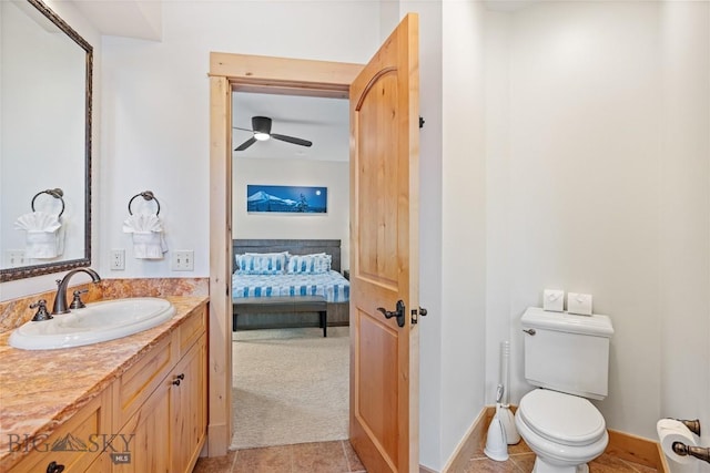 99 Pheasant Tail Ln Unit 1, Big Sky, MT 59716 - bathroom featuring ensuite bath, vanity, tile patterned floors, and a ceiling fan