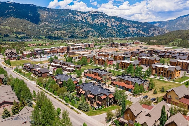 99 Pheasant Tail Ln Unit 1, Big Sky, MT 59716 - aerial perspective of suburban area with a mountainous background