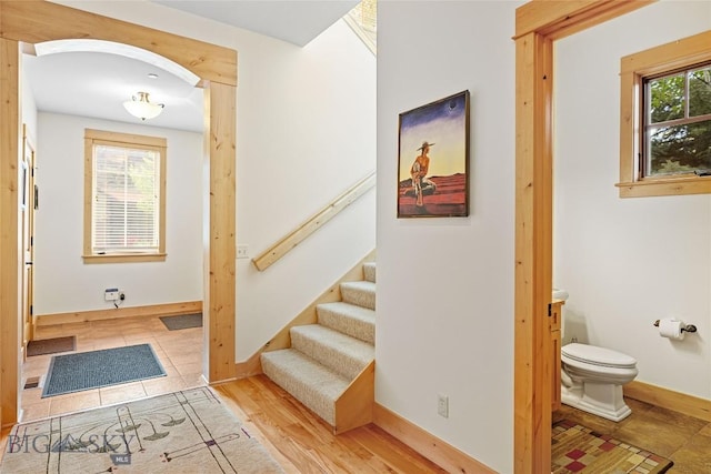 99 Pheasant Tail Ln Unit 1, Big Sky, MT 59716 - entrance foyer featuring stairs and arched walkways