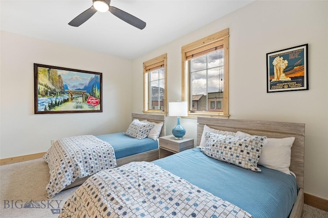 99 Pheasant Tail Ln Unit 1, Big Sky, MT 59716 - bedroom featuring carpet and a ceiling fan