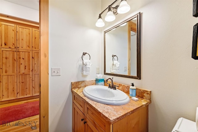 99 Pheasant Tail Ln Unit 1, Big Sky, MT 59716 - bathroom featuring vanity and toilet