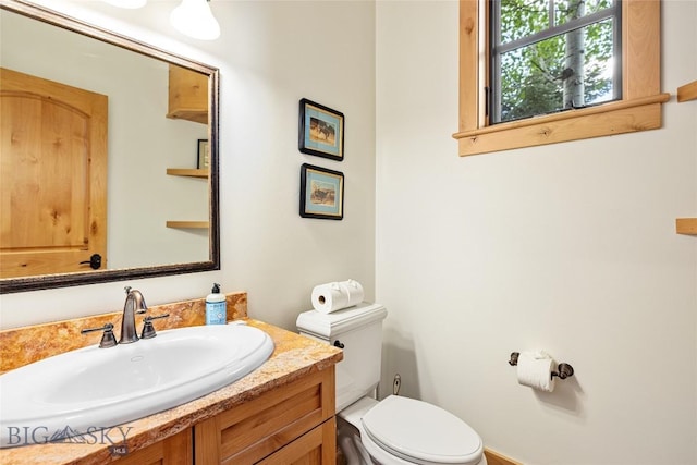 99 Pheasant Tail Ln Unit 1, Big Sky, MT 59716 - half bathroom with toilet and vanity