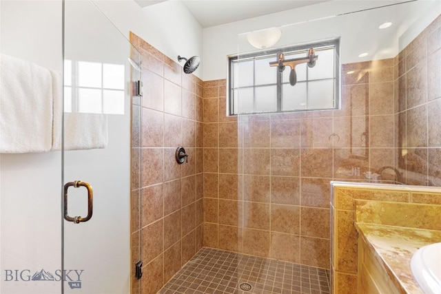 99 Pheasant Tail Ln Unit 1, Big Sky, MT 59716 - bathroom with a stall shower and vanity