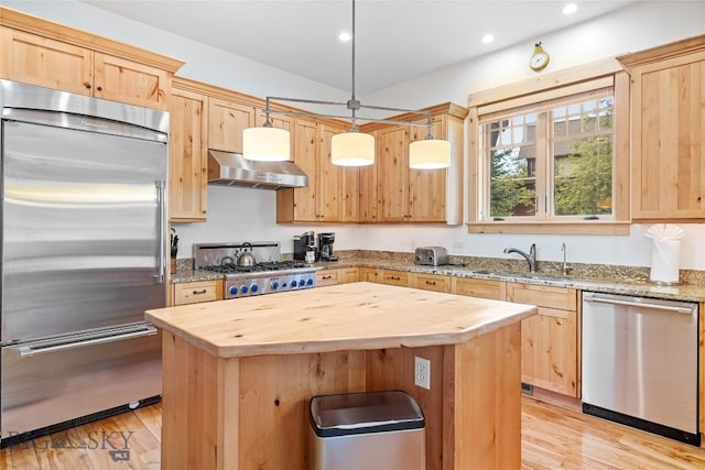 99 Pheasant Tail Ln Unit 1, Big Sky, MT 59716 - kitchen featuring stainless steel appliances, wooden counters, light brown cabinets, range hood, and recessed lighting