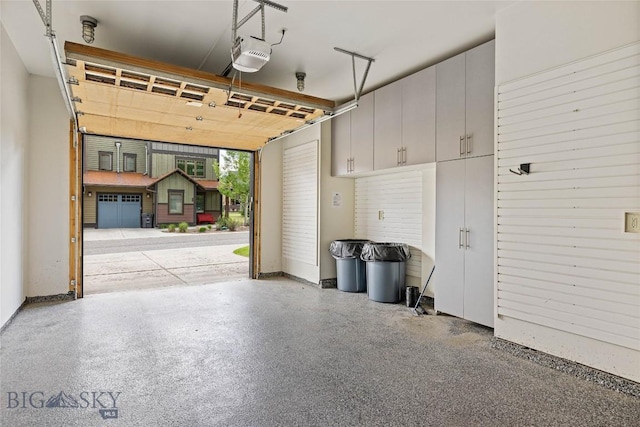 99 Pheasant Tail Ln Unit 1, Big Sky, MT 59716 - garage featuring a garage door opener