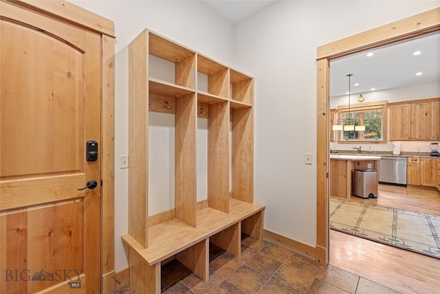99 Pheasant Tail Ln Unit 1, Big Sky, MT 59716 - mudroom featuring baseboards and recessed lighting