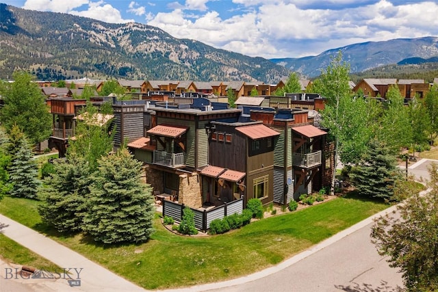 99 Pheasant Tail Ln Unit 1, Big Sky, MT 59716 - view of mountain background with nearby suburban area
