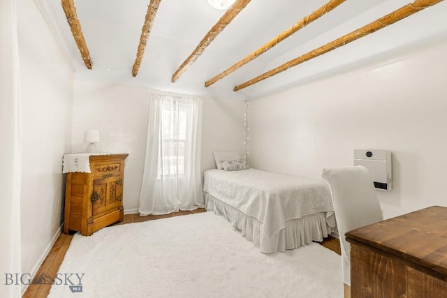 12977 Cottonwood Rd, Bozeman, MT 59718 - bedroom featuring wood finished floors and baseboards