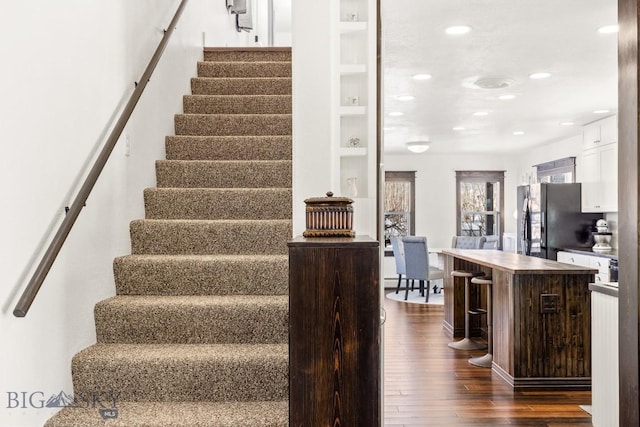 12977 Cottonwood Rd, Bozeman, MT 59718 - stairway with wood finished floors and recessed lighting
