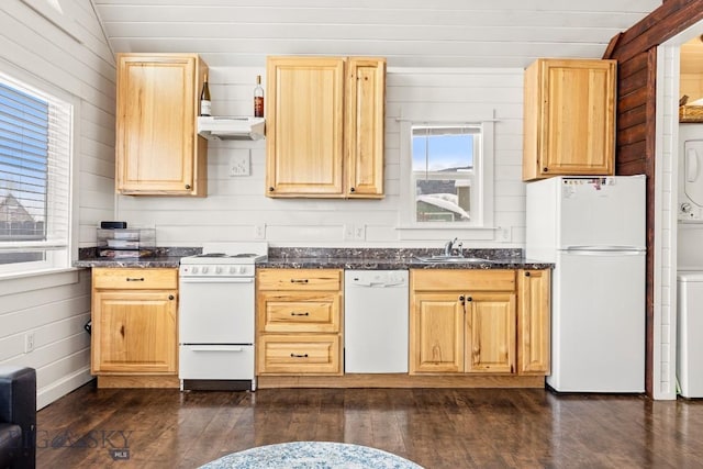 12977 Cottonwood Rd, Bozeman, MT 59718 - kitchen with white appliances, exhaust hood, dark wood finished floors, light brown cabinetry, and wood walls