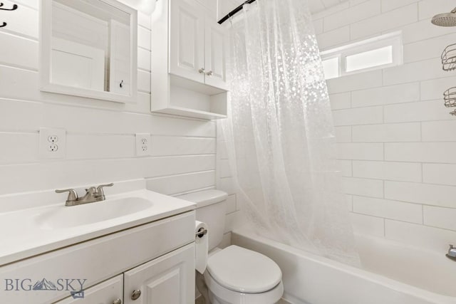 12977 Cottonwood Rd, Bozeman, MT 59718 - bathroom featuring shower / bath combo with shower curtain and vanity